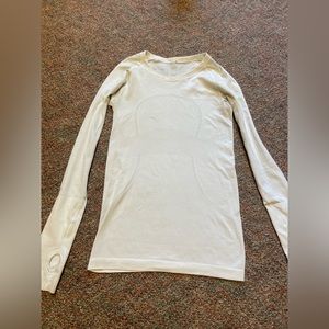 White form fitting long sleeve shirt